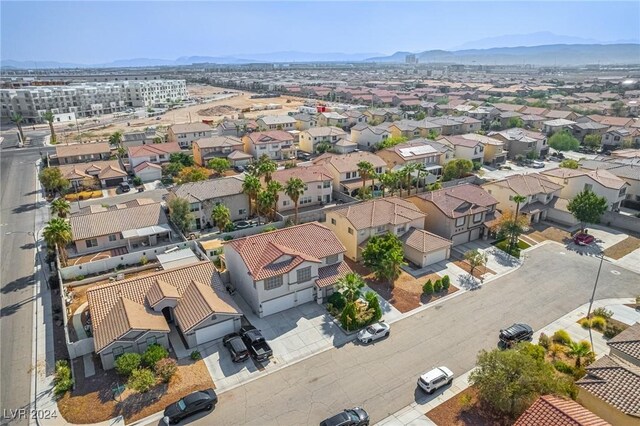 drone / aerial view featuring a mountain view