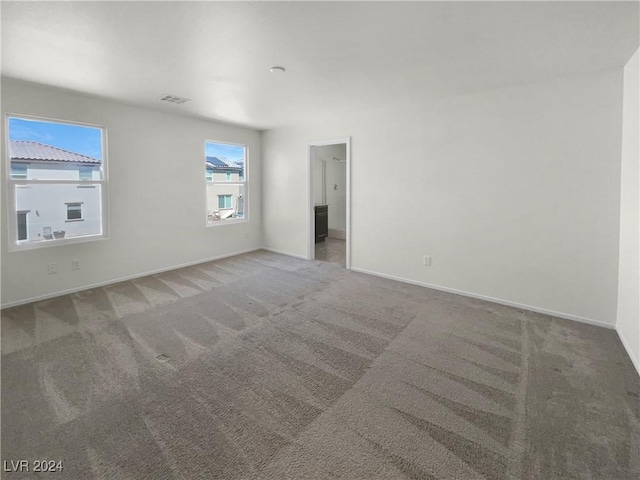 view of carpeted spare room