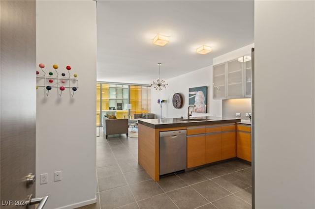 kitchen with dishwasher, tile patterned flooring, a chandelier, sink, and kitchen peninsula