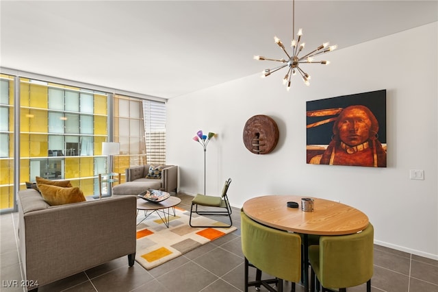 tiled dining area featuring a notable chandelier and floor to ceiling windows