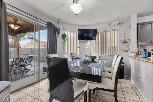 dining room featuring light tile patterned flooring