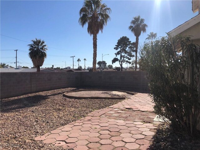 view of yard with a patio area and a fenced backyard