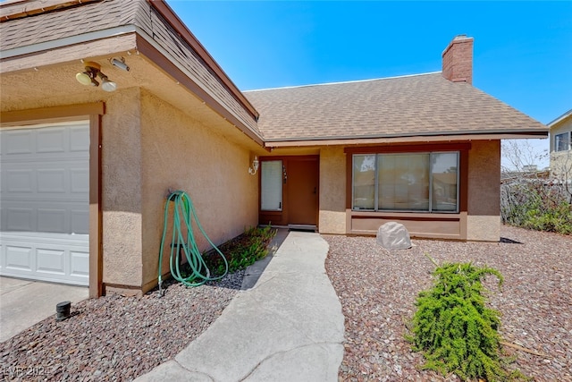 property entrance featuring a garage