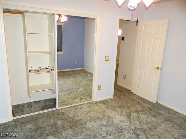 unfurnished bedroom with a closet, ceiling fan, and carpet