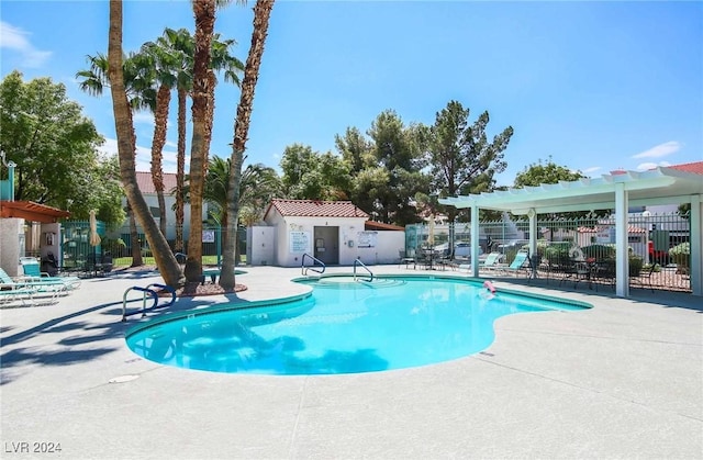 view of pool featuring a pergola and a patio area