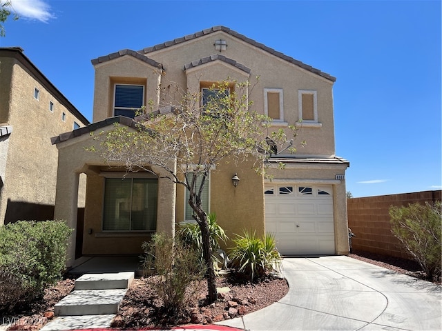 view of front of property with a garage