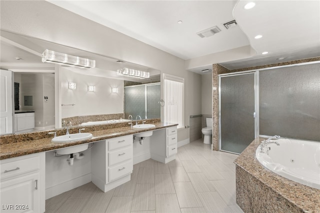 full bathroom featuring dual vanity, toilet, independent shower and bath, and tile patterned flooring