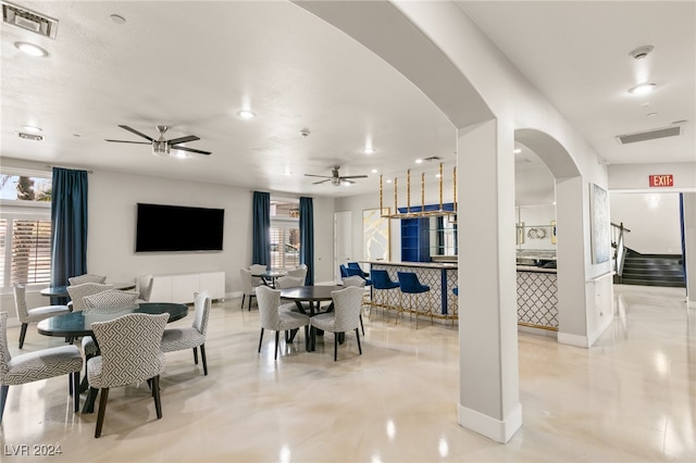 dining space featuring ceiling fan