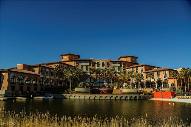 view of building exterior featuring a water view