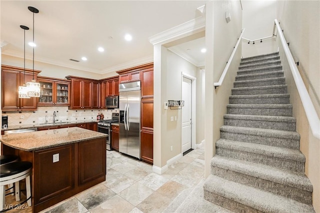 kitchen with a center island, decorative light fixtures, stainless steel appliances, glass insert cabinets, and light stone countertops