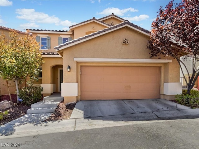 view of front of property featuring a garage