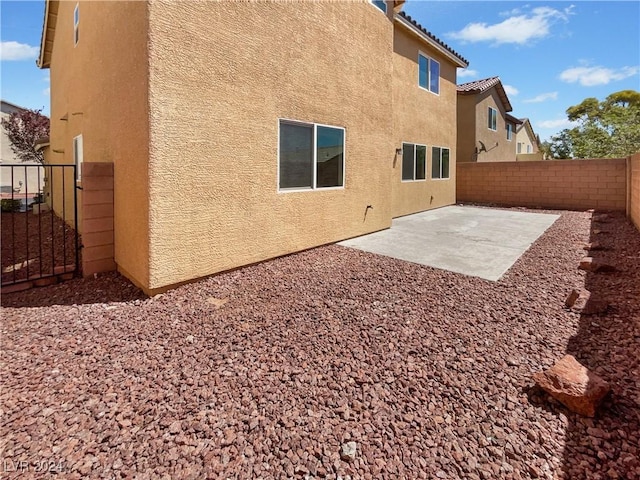 rear view of house with a patio area