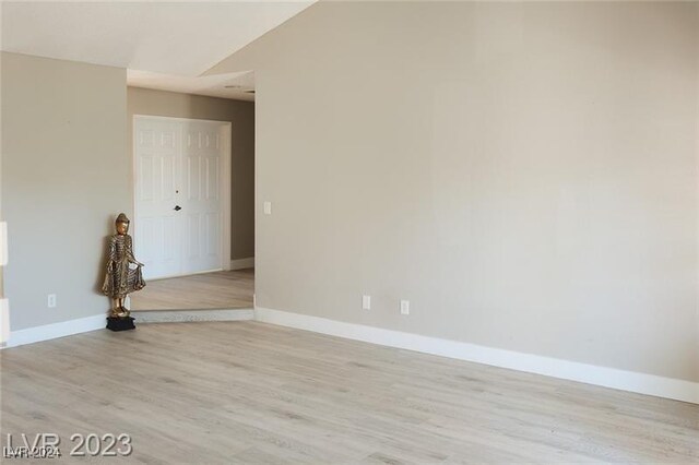 spare room featuring light wood-type flooring