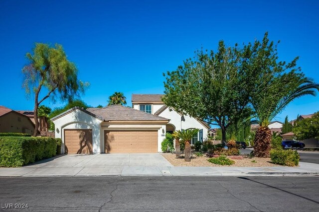 view of front of property with a garage