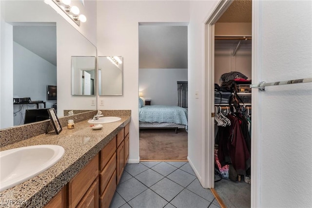 bathroom with vanity and tile patterned floors