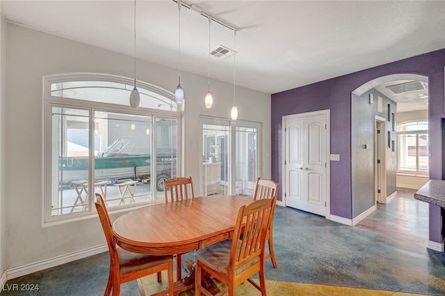 dining area with rail lighting