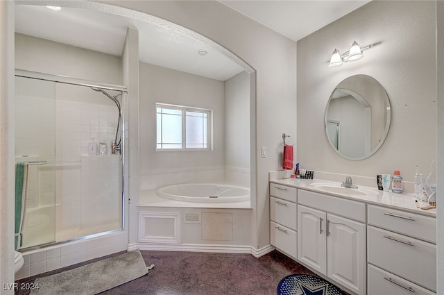 bathroom with shower with separate bathtub and vanity