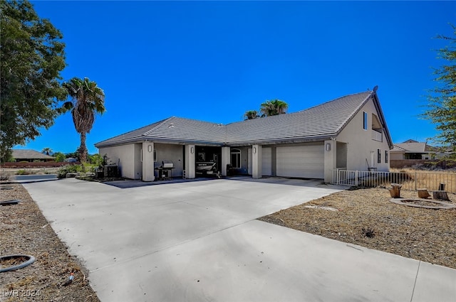 view of front of property with a garage