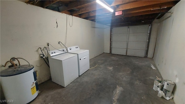 interior space with washer and clothes dryer and electric water heater