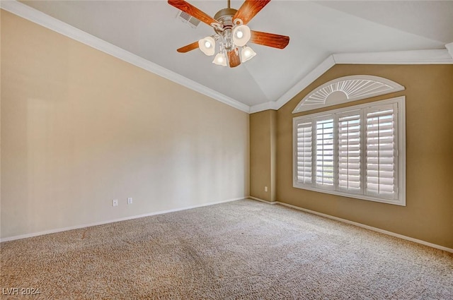 unfurnished room with carpet floors, visible vents, baseboards, vaulted ceiling, and ornamental molding