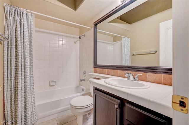 bathroom with toilet, shower / bathtub combination with curtain, tile patterned flooring, and vanity