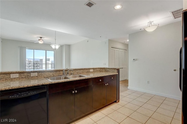 kitchen featuring light tile patterned flooring, dark brown cabinetry, a sink, visible vents, and dishwasher