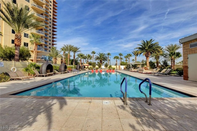 pool with a patio area