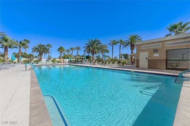 community pool with a patio