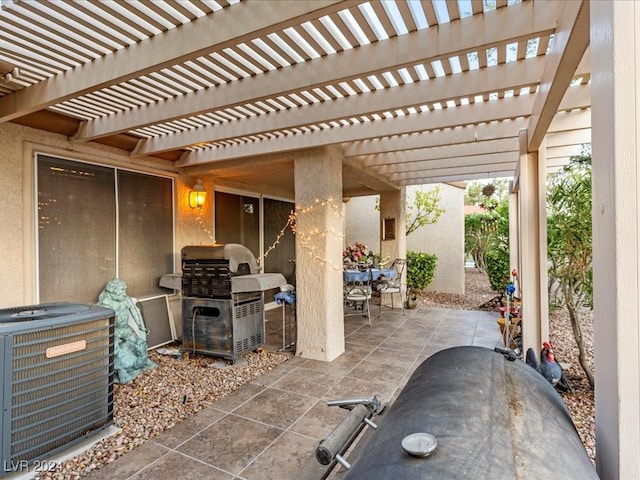 view of patio / terrace with central AC unit, a pergola, and area for grilling