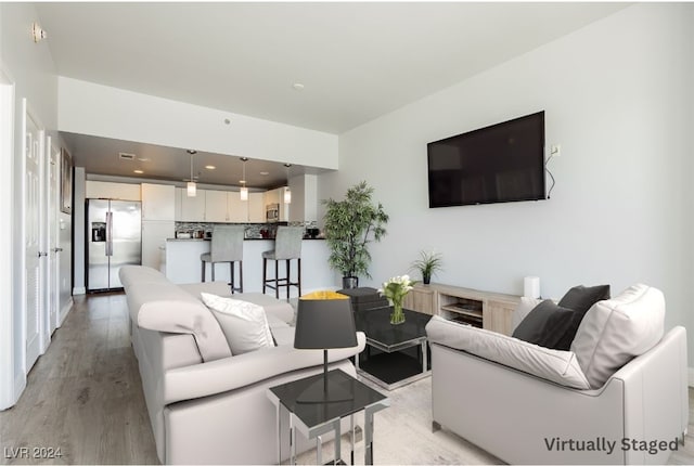 living room featuring light hardwood / wood-style floors