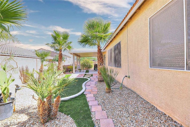 view of yard featuring a patio area and fence