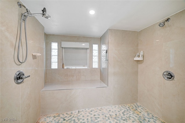 bathroom featuring tiled shower