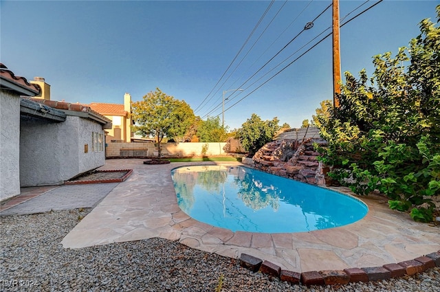 view of pool featuring a patio