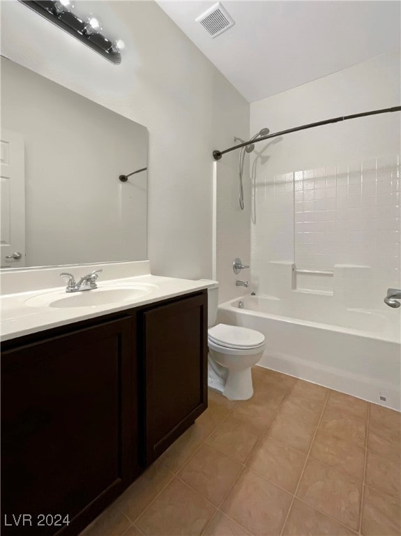 full bathroom with bathing tub / shower combination, toilet, tile patterned flooring, and vanity