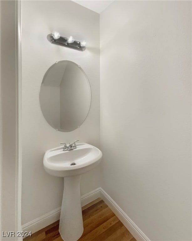 bathroom featuring hardwood / wood-style flooring