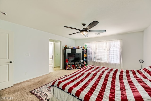 bedroom featuring ceiling fan and light carpet