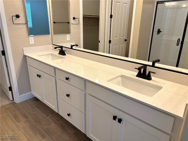 bathroom with vanity and walk in shower