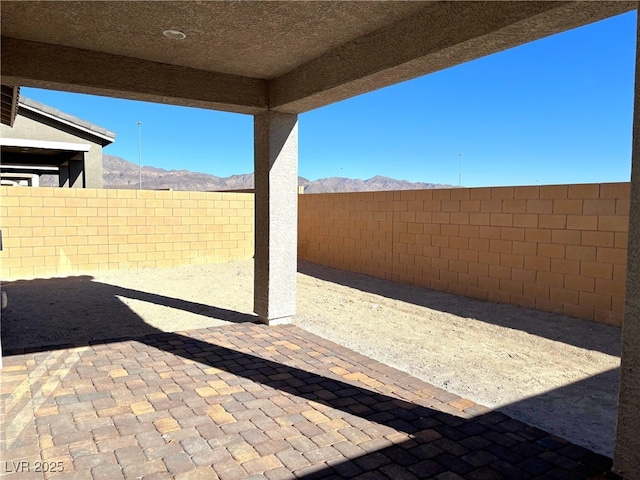 view of patio featuring a mountain view