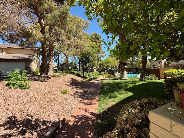 view of yard with a garage