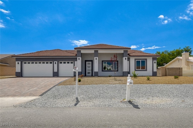 view of front of home with a garage