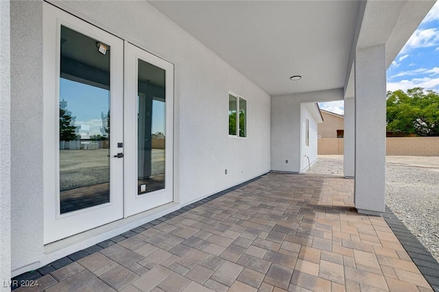 view of patio with fence and french doors