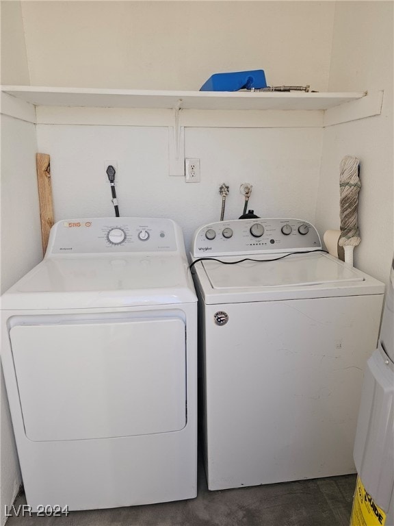 washroom featuring laundry area and independent washer and dryer