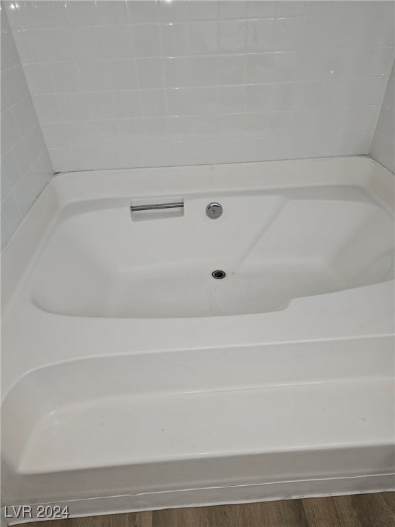 bathroom featuring wood finished floors