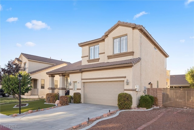 view of front of property with a garage