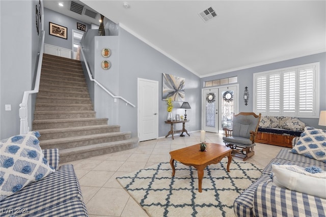 tiled living room with lofted ceiling and ornamental molding