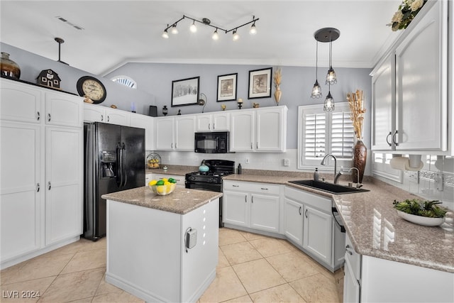 kitchen featuring white cabinetry, sink, black appliances, a center island, and vaulted ceiling