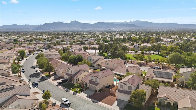 birds eye view of property featuring a mountain view