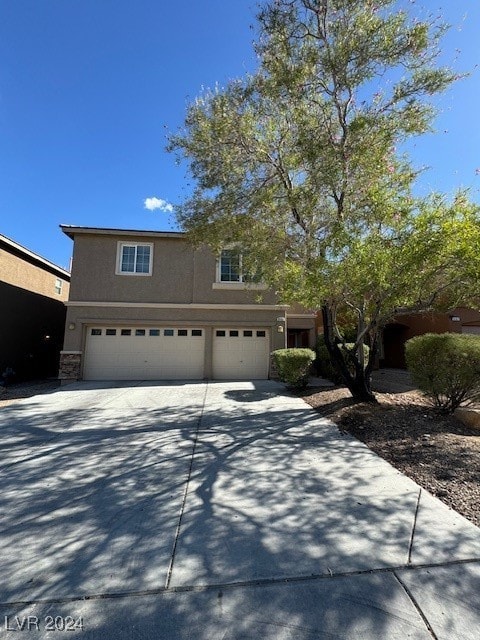 front of property featuring a garage