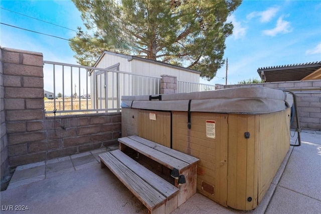 view of patio / terrace featuring a hot tub