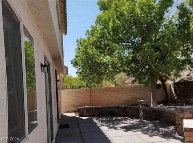 1700 Ravanusa Dr, Henderson, NV 89052 - view of patio / terrace featuring a fenced backyard